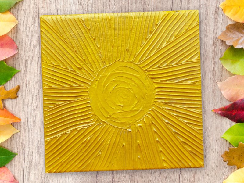 Sun textured mixed media art in yellow and gold