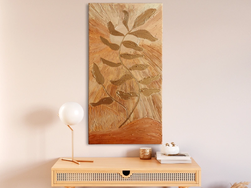 Mixed media art with texture in bronze colors showing a plant in the summer sun