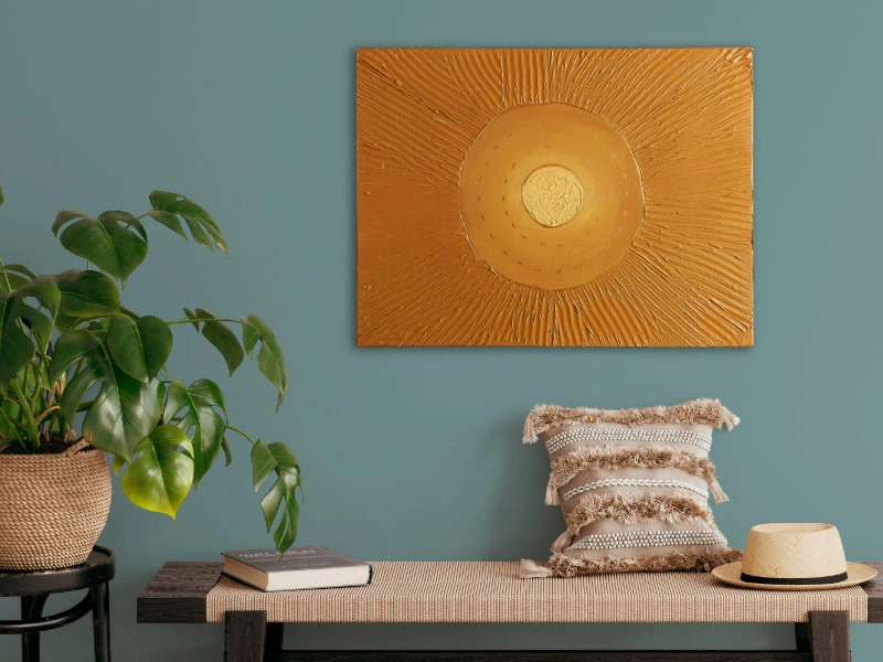 Textured mixed media art of the sun in warm terracotta colors 1